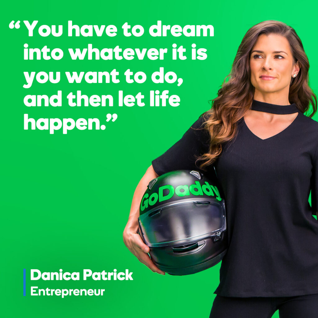 GoDaddy social media ad featuring Danica Patrick holding helmet with inspirational quote about entrepreneurship