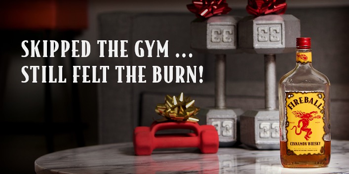 Fireball Whisky social media ad with bottle and humorous message “Skipped the gym still felt the burn”